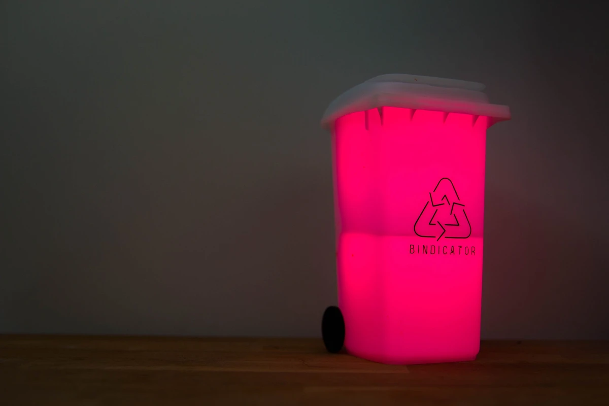 Bindicator glowing pink on a kitchen bench